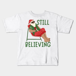 Still Believing in Santa because I'm the Santa. Kids T-Shirt